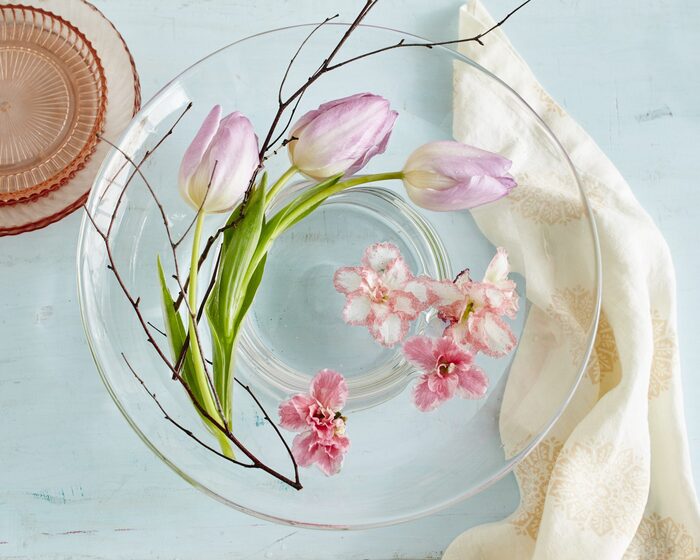 easy spring arrangements transparent glass bowl with spring flowers in it pink tulips and small pink flowers