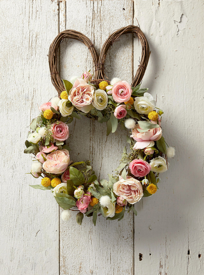 upcycled easter wreath with a rabbit shape with spring flowers