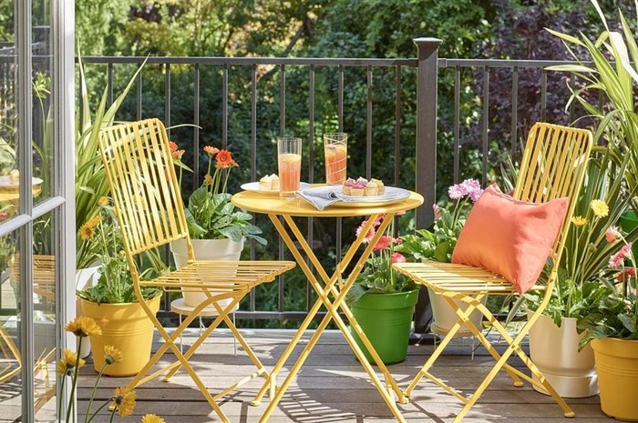 beautiful balcony ideas small balcony with yellow metal furniture and green plants