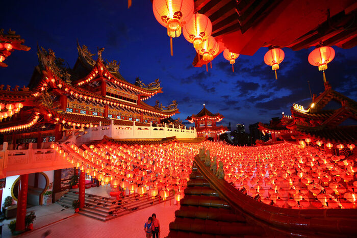 picture from china with red lanterns everywhere and a dark blue night sky