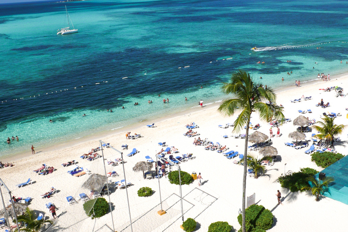 cable beach on the bahamas with white sand and clear water