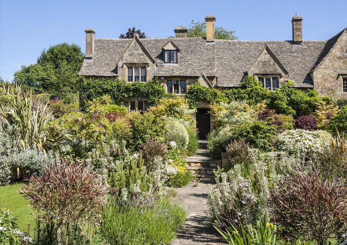 english countryside typical cottages with beautifully designed front yards