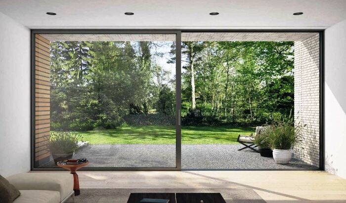large sliding patio door in a modern interior space with dark frames