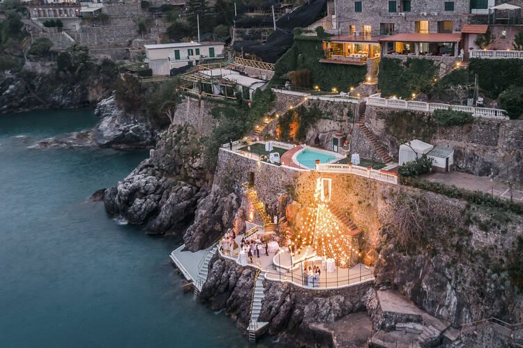 palazzo avino luxury beach bar on a rock terrace with a small pool overlooking the sea