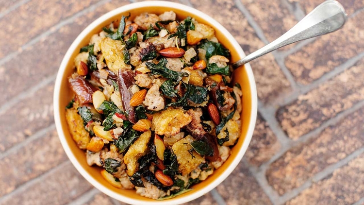 kale stuffing with various vegetables in a large bowl 